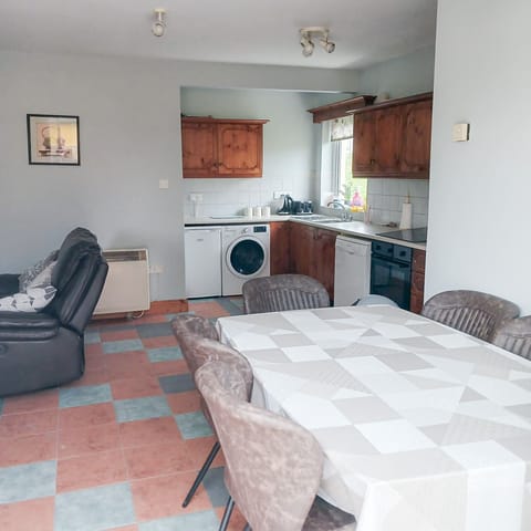 Cosy open plan Kitchen with dining area at Seamount Holiday Village No 26. Sea side holiday home in Co Wexford.