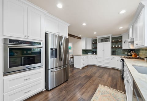 Ample storage and top-notch appliances make this kitchen as practical as it is beautiful.