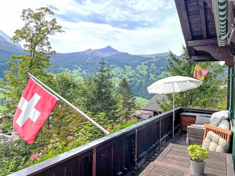 Sky, Daytime, Property, Cloud, Plant, Mountain, Building, Green, Flowerpot, Umbrella