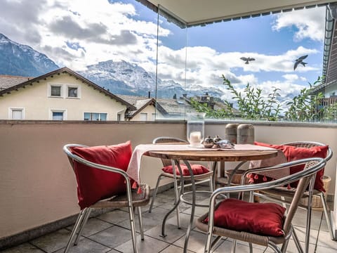 Cloud, Sky, Table, Furniture, Property, Building, Window, Outdoor Furniture, Interior Design, Wood