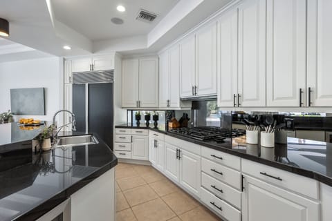 Clean white cabinetry with all the amenities you need