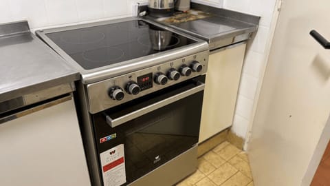 Fridge, oven, cookware/dishes/utensils