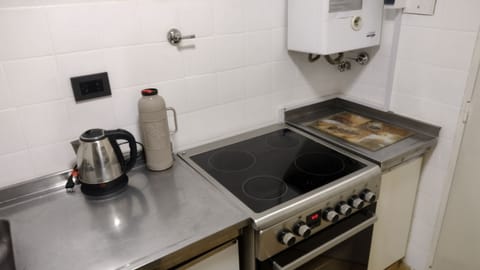 Fridge, oven, cookware/dishes/utensils