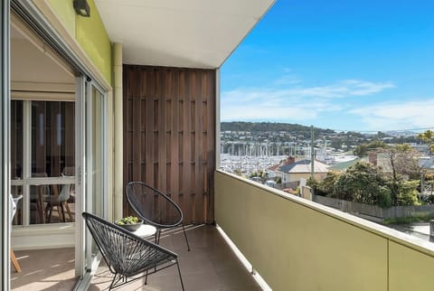 Soak up scenic views of the yacht club and surrounding nature from your private balcony.