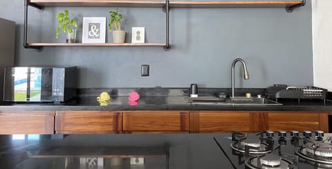 A fully equipped kitchen, ready to impress everyone with a gourmet meal