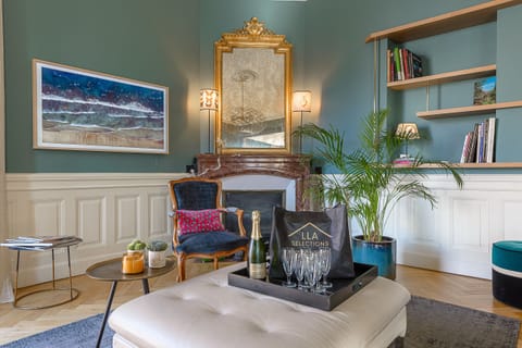 Spacious lounge with connected TV and balcony access