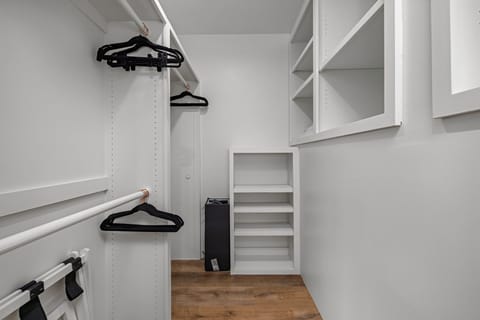 Primary closet with a pack n play