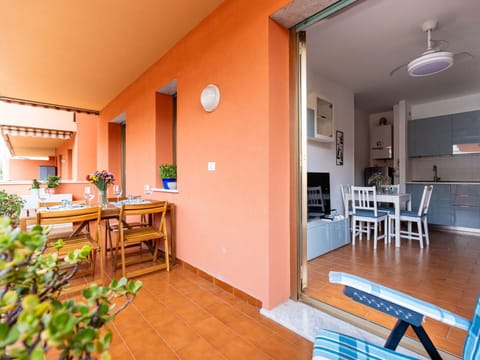 Cloud, Sky, Table, Plant, Furniture, Chair, Tableware, Building, Azure, Flowerpot