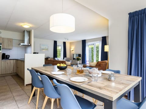 Cloud, Sky, Table, Plant, Furniture, Chair, Tableware, Building, Azure, Flowerpot