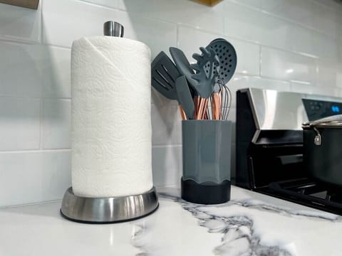 With kitchen cutlery and utensils