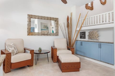 Discover cozy nooks and comfortable reading corners in this expansive living room, perfect for unwinding after a day of adventure.