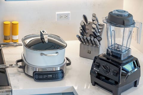 The new design of the chef’s kitchen features a coffee station and all the equipment needed for gourmet cooking, making meal prep a pleasure.