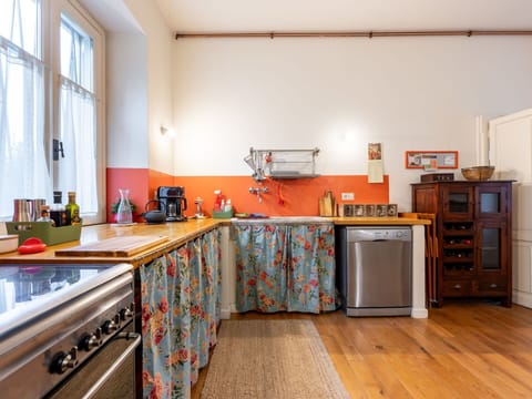 Cabinetry, Countertop, Property, Furniture, Kitchen, Sink, Window, Wood, Kitchen Stove, Kitchen Appliance