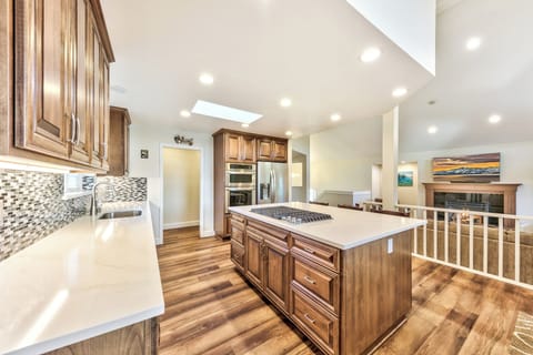 The kitchen is equiped with high end appliances, a chefs dream