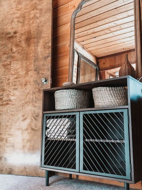 Linen cabinet where you will find extra towels, a room diffuser and essentialOils.