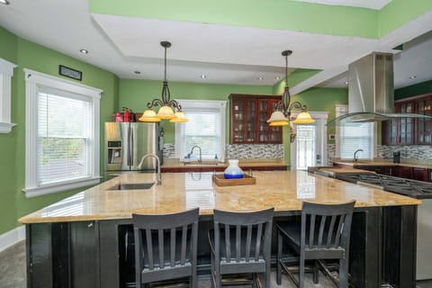 Sip morning coffee or grab a bite at the kitchen counter, with seating for 3