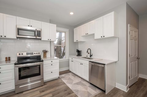 The eat-in kitchen offers ample space & all the comforts of home