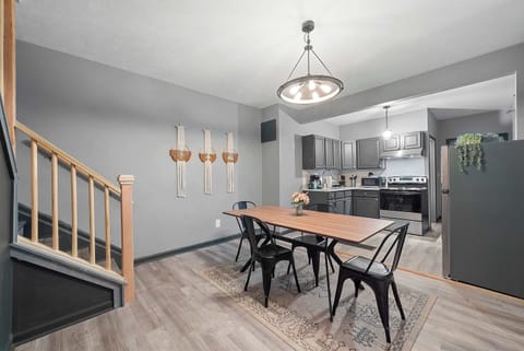 Gather for meals together at the dining table, with seating for 4