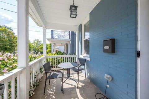 Sip morning coffee or an evening cocktail on the breezy front porch