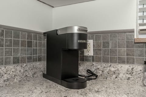 The large, airy kitchen is well-equipped for your visit