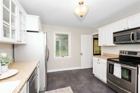 The updated kitchen is spacious & offers all the comforts of home