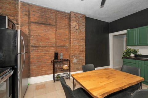 Enjoy mealtimes together at the dining table, seating 4