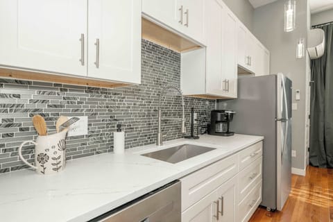 Grab morning coffee or prepare culinary delights in the fully equipped kitchen