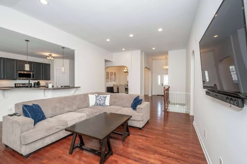 Relax with your favorite streaming entertainment in the open living room