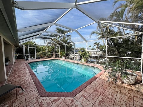 3-bedroom pool house on manatee-filled canal. BYOB: Bring your own boat House in St James City