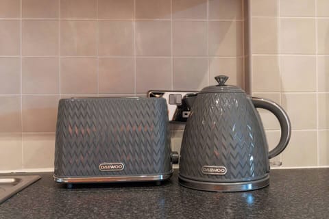 A fully fitted kitchen with everything you need to make your stay comfortable — from cooking home-made meals to enjoying a relaxed night in