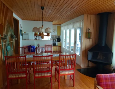 Open livingspace with kitchen, dining and sitting space.