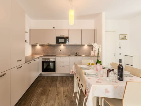 Cabinetry, Countertop, Furniture, Property, Kitchen Stove, Sink, Wood, Kitchen Appliance, Kitchen, Home Appliance