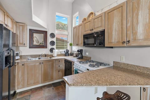 Kitchen With Vaulted Ceiling and Great Views Too