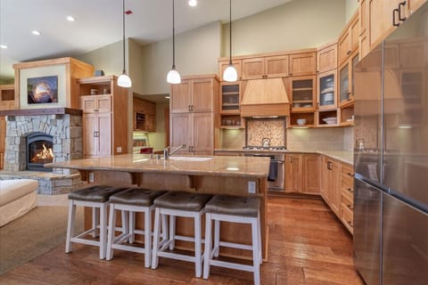 Gourmet kitchen with large island with espresso machine, drip coffee machine, large kitchen island, beverage center, and everything else you`ll need!