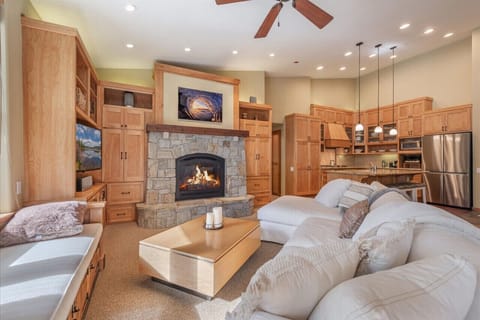 Incredibly comfortable living room with views to the mountain and lifts, fireplace, smart TV, and more.
