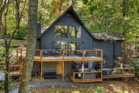 Double-decker deck with plenty of outdoor space with multiple seating areas