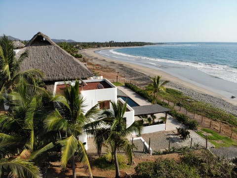 Panoramic view of the beach and surf break.