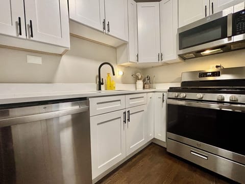 Enjoy your stay here with a brand new kitchen with matching appliances.