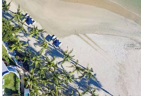 On the beach, sun loungers, beach towels