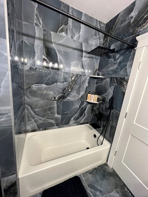 Shower, jetted tub, hair dryer, towels