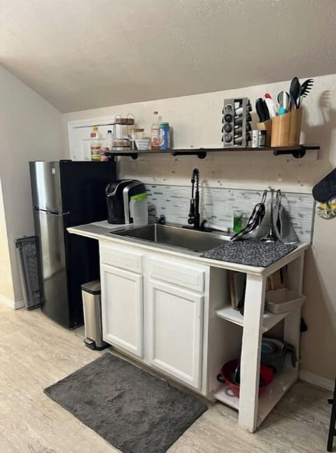 Fridge, coffee/tea maker, toaster, dining tables