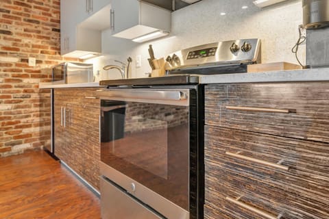 Kitchen: A fully equipped kitchen with sleek, modern appliances for all your cooking needs.
