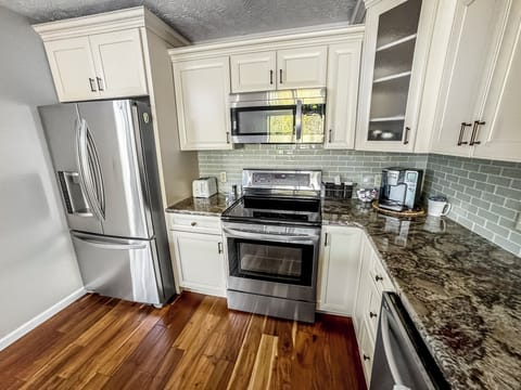 Kitchen - Stove, Microwave, Refrigerator, Coffee Maker