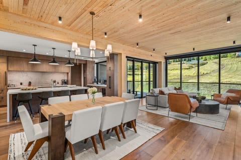 Open floor plan: living room, dining room table and gourmet kitchen