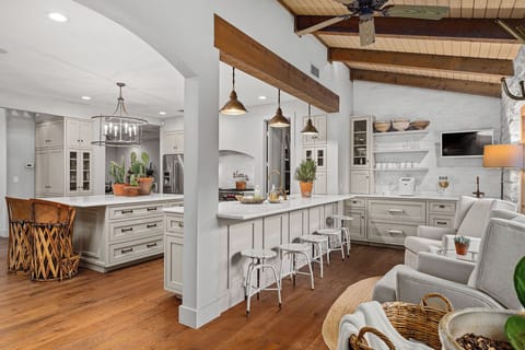 Everything you need for hosting a gathering is at your fingertips in this fully equipped kitchen.