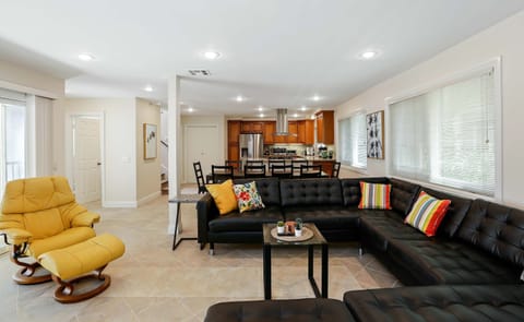 Living room with comfortable seating around a Smart TV (Netflix, Hulu, etc.)