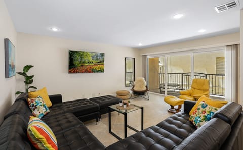 Living room with comfortable seating around a Smart TV (Netflix, Hulu, etc.)