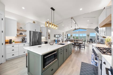 Kitchen Island seating for 6, two sinks, 36" gas range and oven