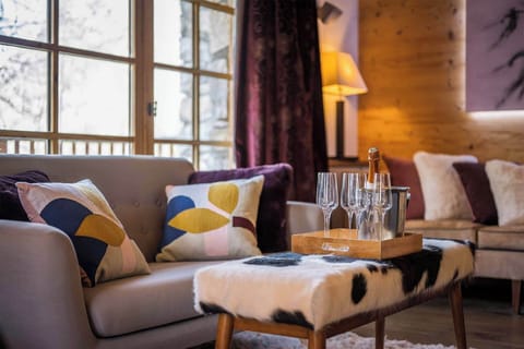 Kick back your feet and relax on the cozy couch.