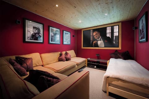 You will love the cinema room on the lower ground floor of the chalet!
